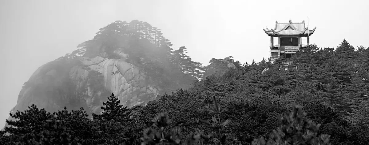 Misty granite peaks of the Yellow Mountains in May